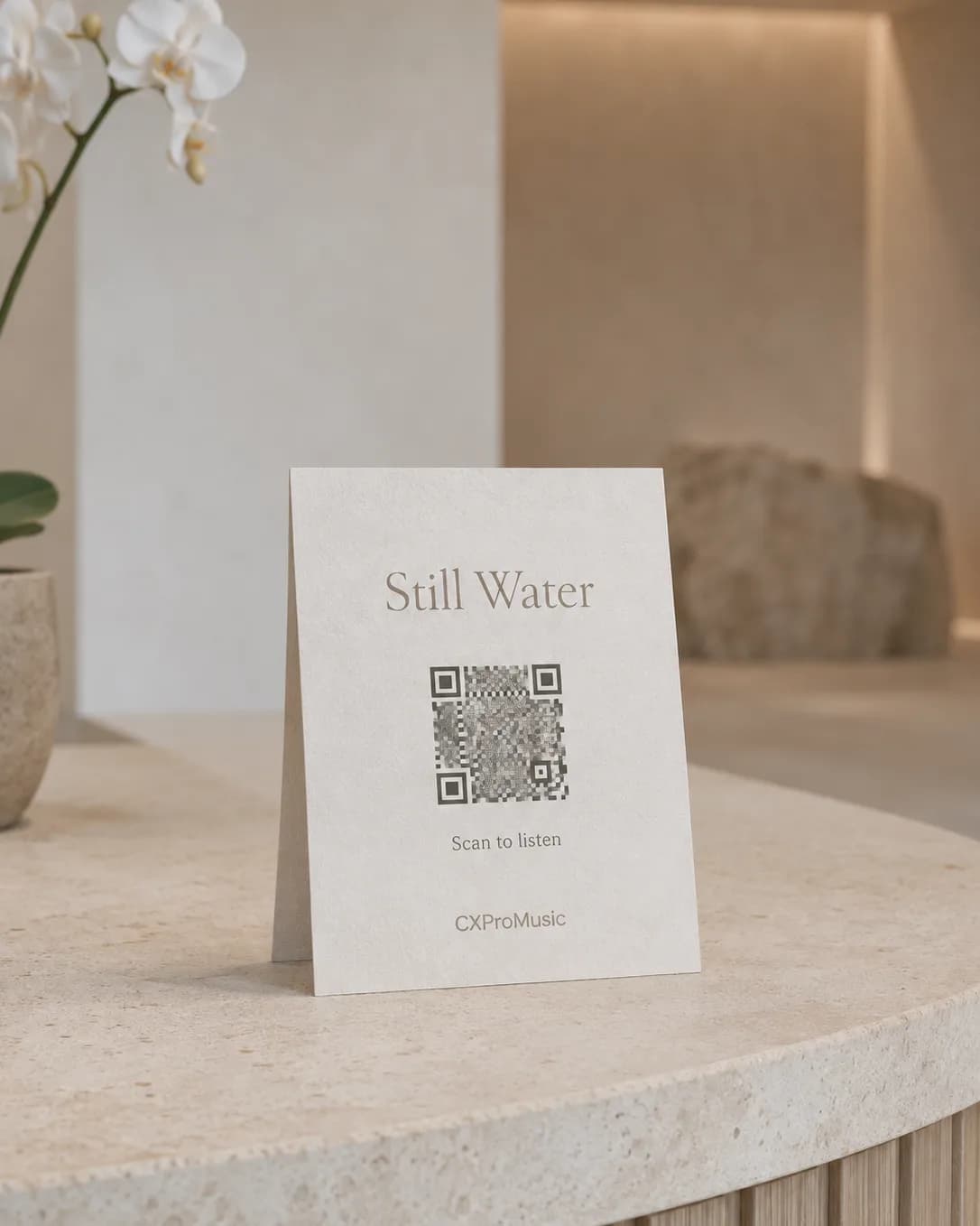 A quiet card at a spa reception desk.