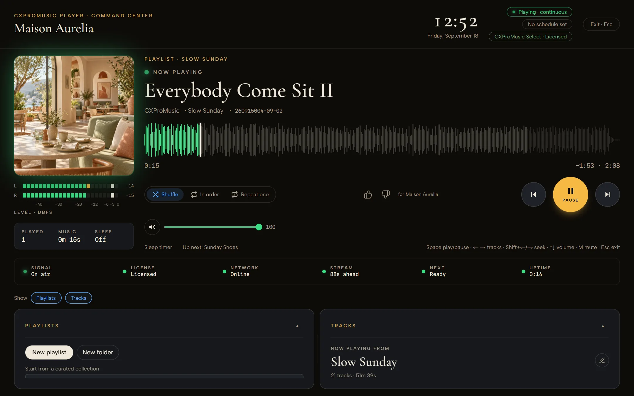 The CXProMusic Player in full-screen view: the track now playing, its waveform, level meters, and status lights for signal, licence, network and stream